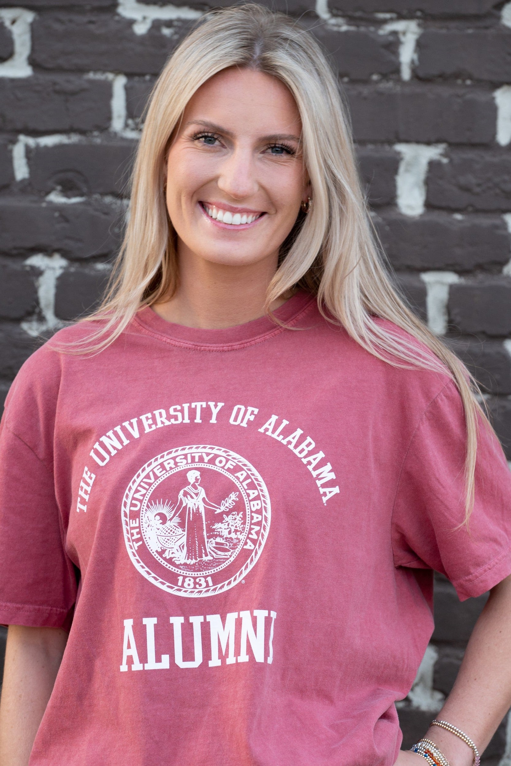 University of Alabama Red Alumni T-Shirt with White text "University of Alabama" above the White Alumni Seal and White text "Alumni" below
