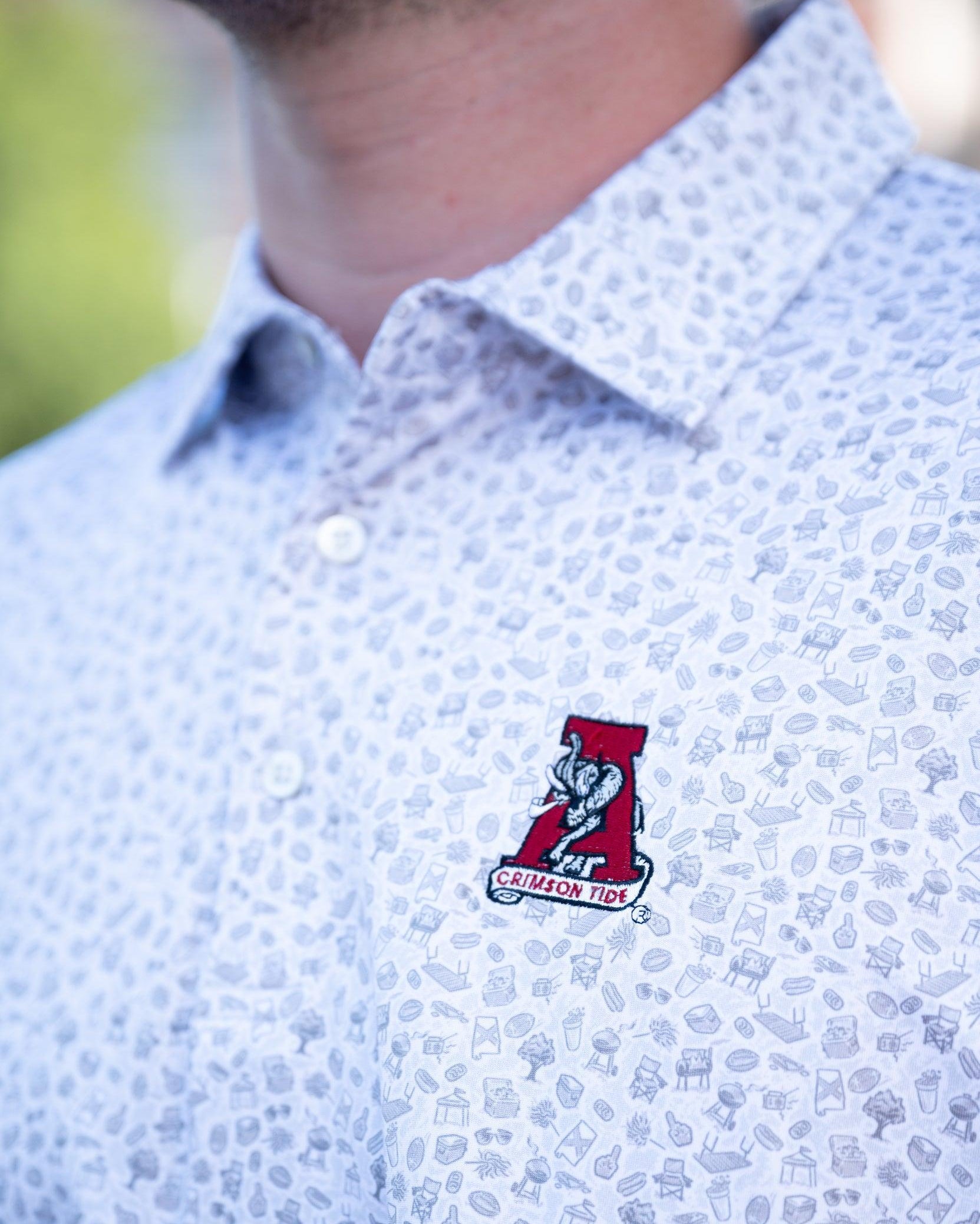 University of Alabama Grey UA Tailgate Men's Polo with a small Grey pattern of Drinks, Snacks, Grills, and Alabama states, etc. and Vintage A Logo Embroidery
