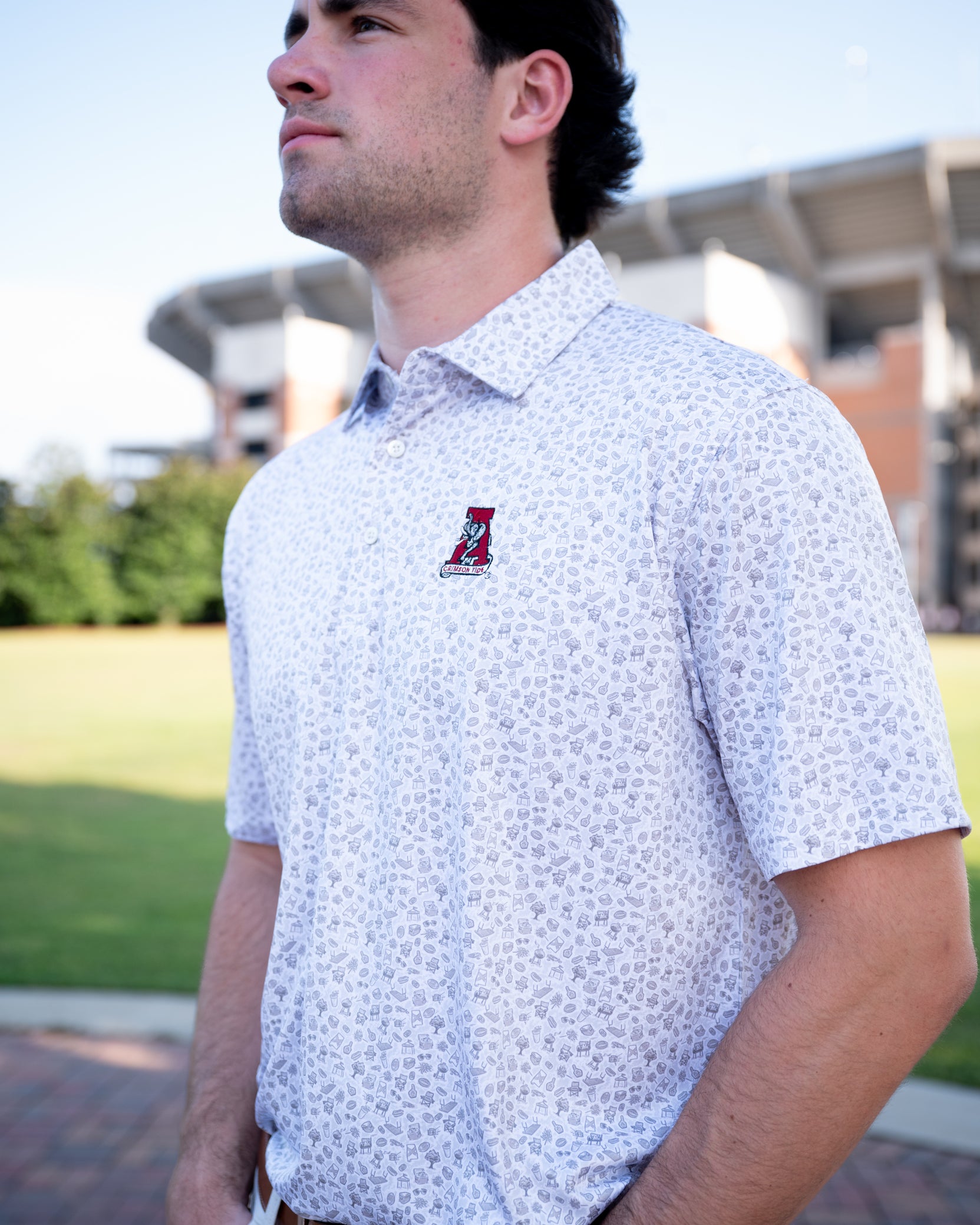 University of Alabama Grey UA Tailgate Men's Polo with a small Grey pattern of Drinks, Snacks, Grills, and Alabama states, etc. and Vintage A Logo Embroidery