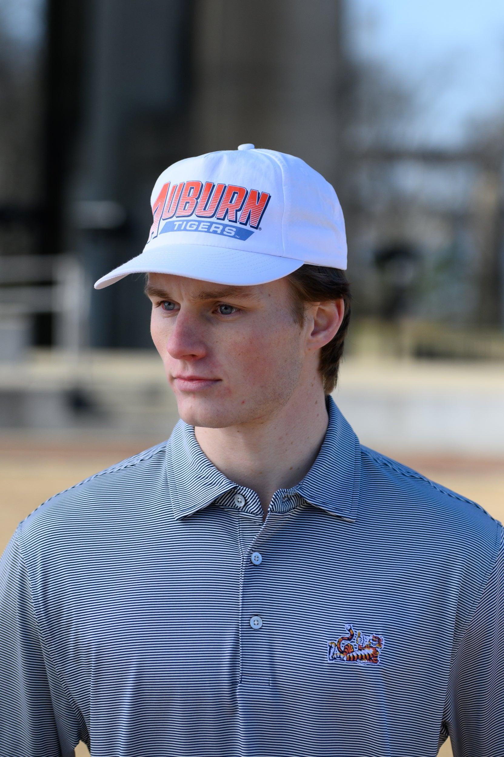 Auburn University White Hat with Orange text "Auburn" above a Blue Stripe with White text "Tigers"