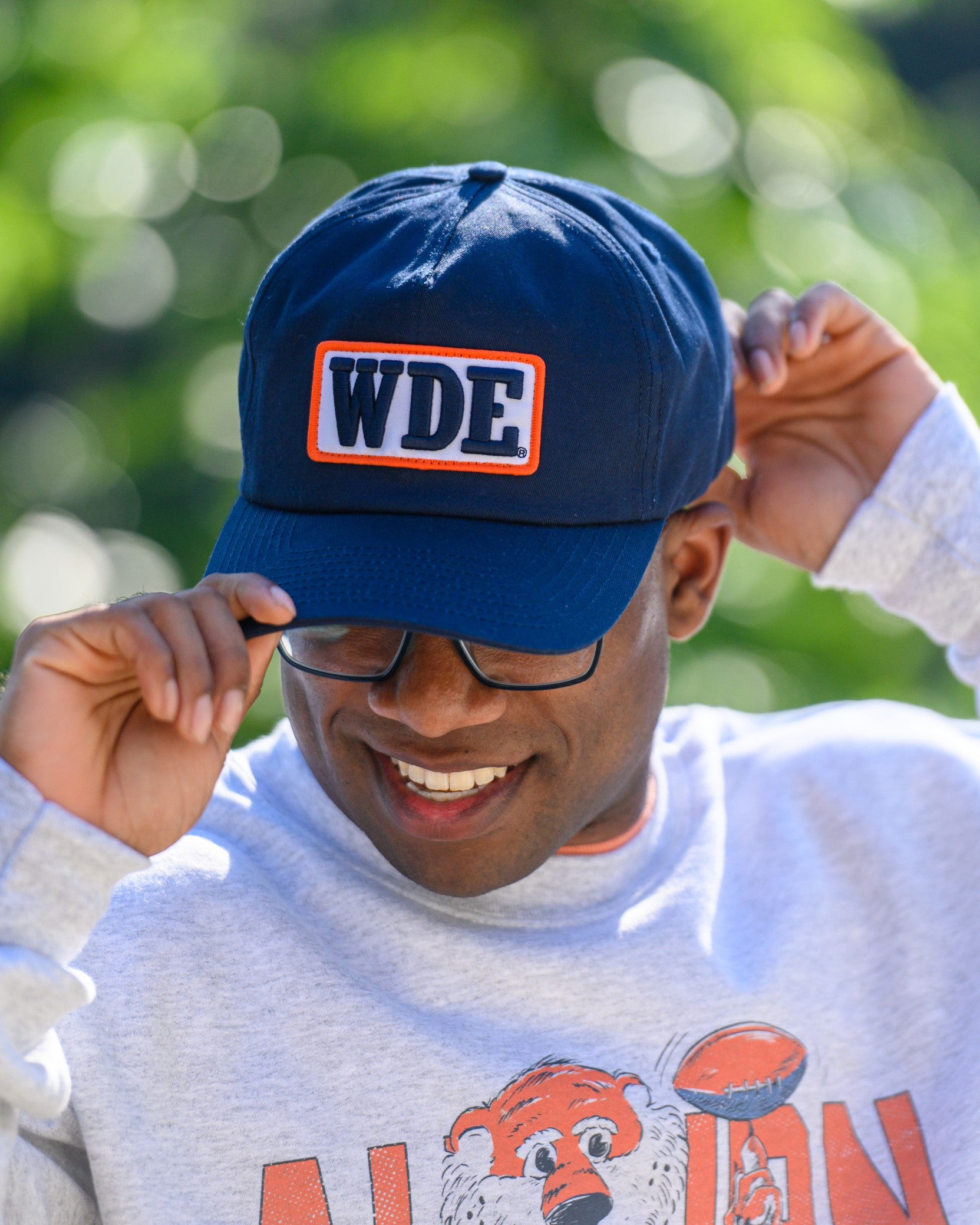 Auburn University Blue Snapback Hat featuring a White patch with Navy letters "WDE"