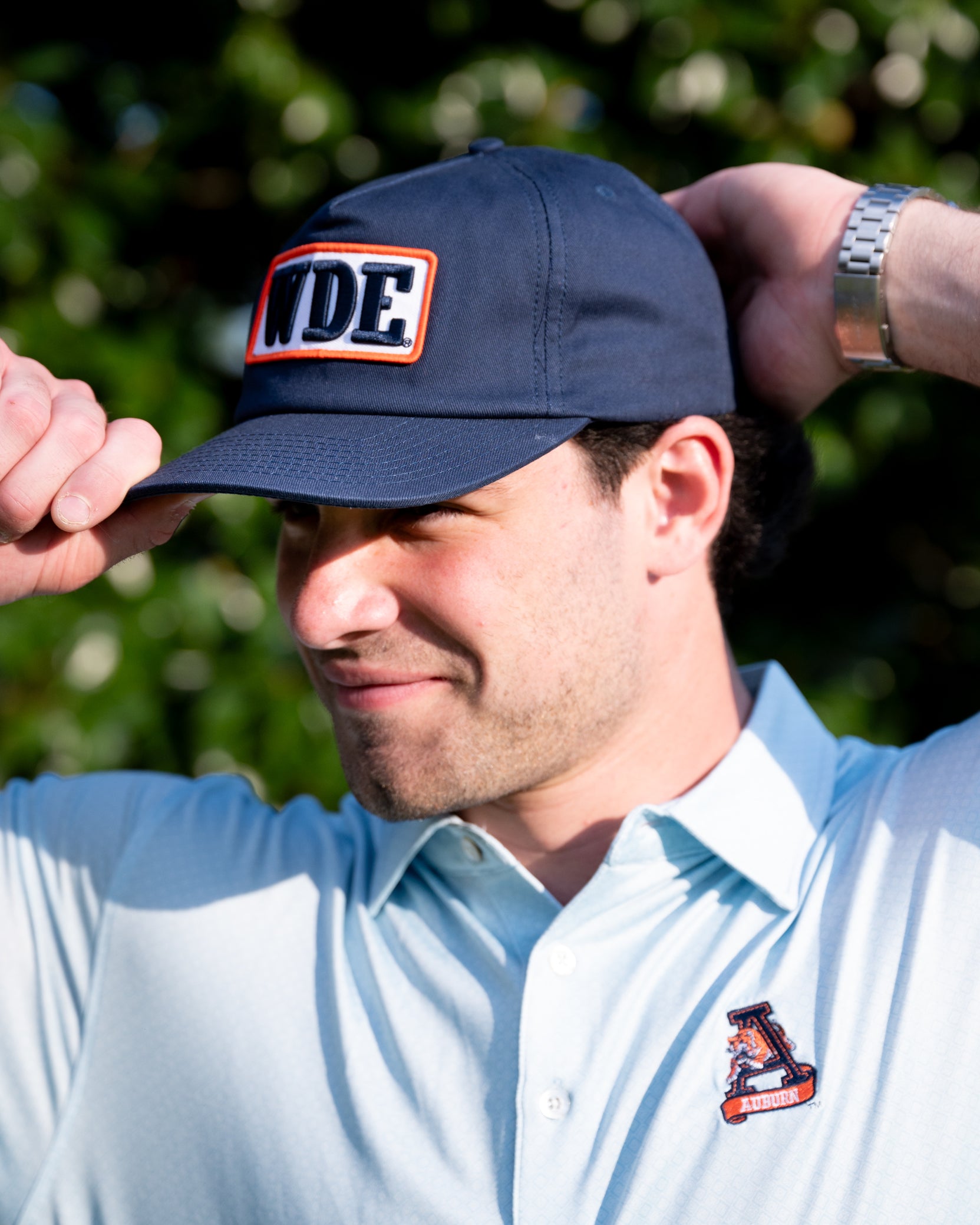 Auburn University Blue Snapback Hat featuring a White patch with Navy letters "WDE"