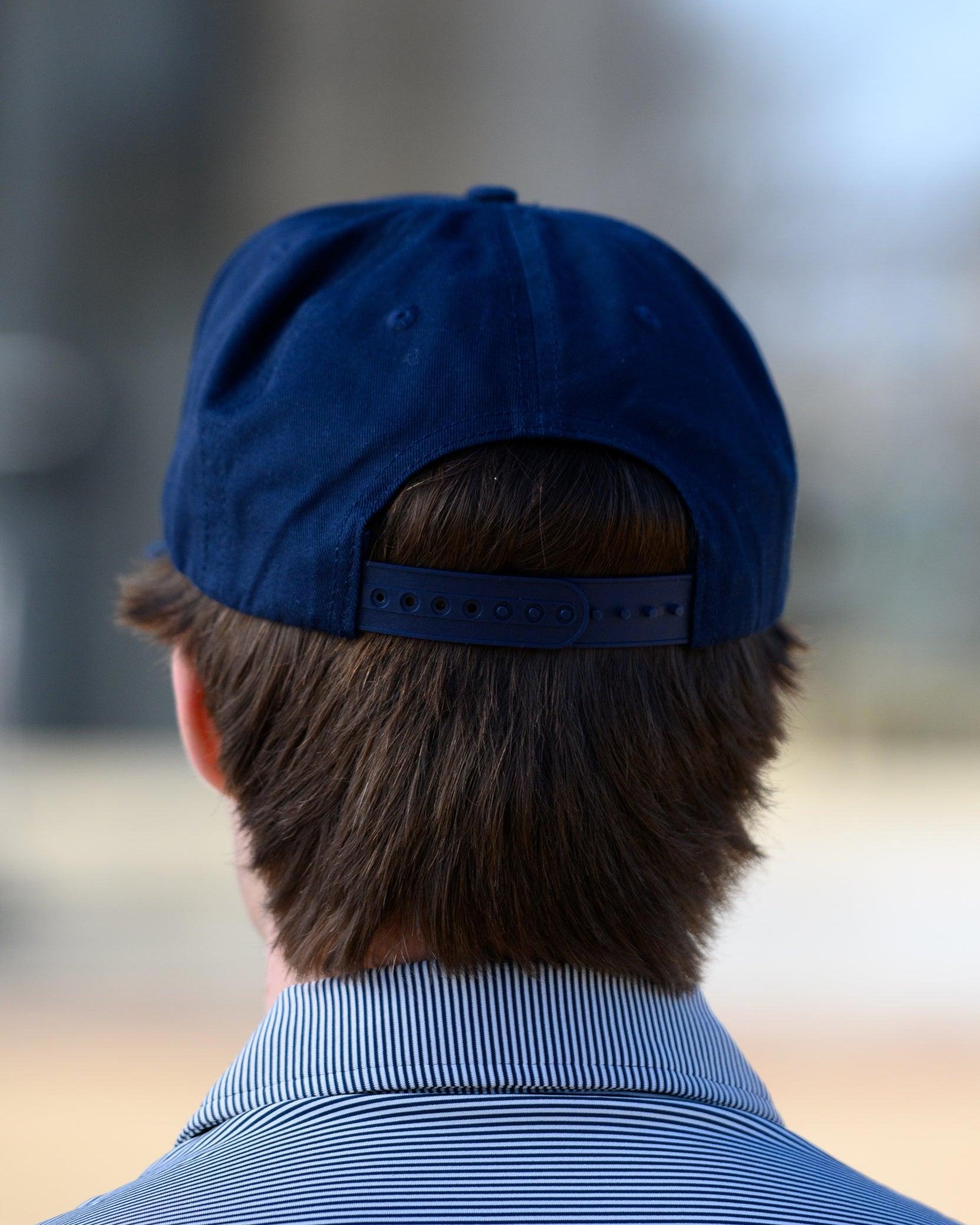 Auburn University Blue Snapback Hat featuring a White patch with Navy letters "WDE"
