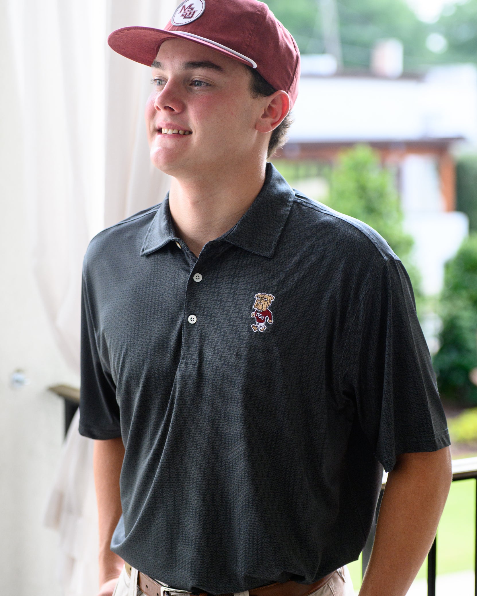 Mississippi State Black Men’s Hex Polo with the Walking Bully Logo embroidery
