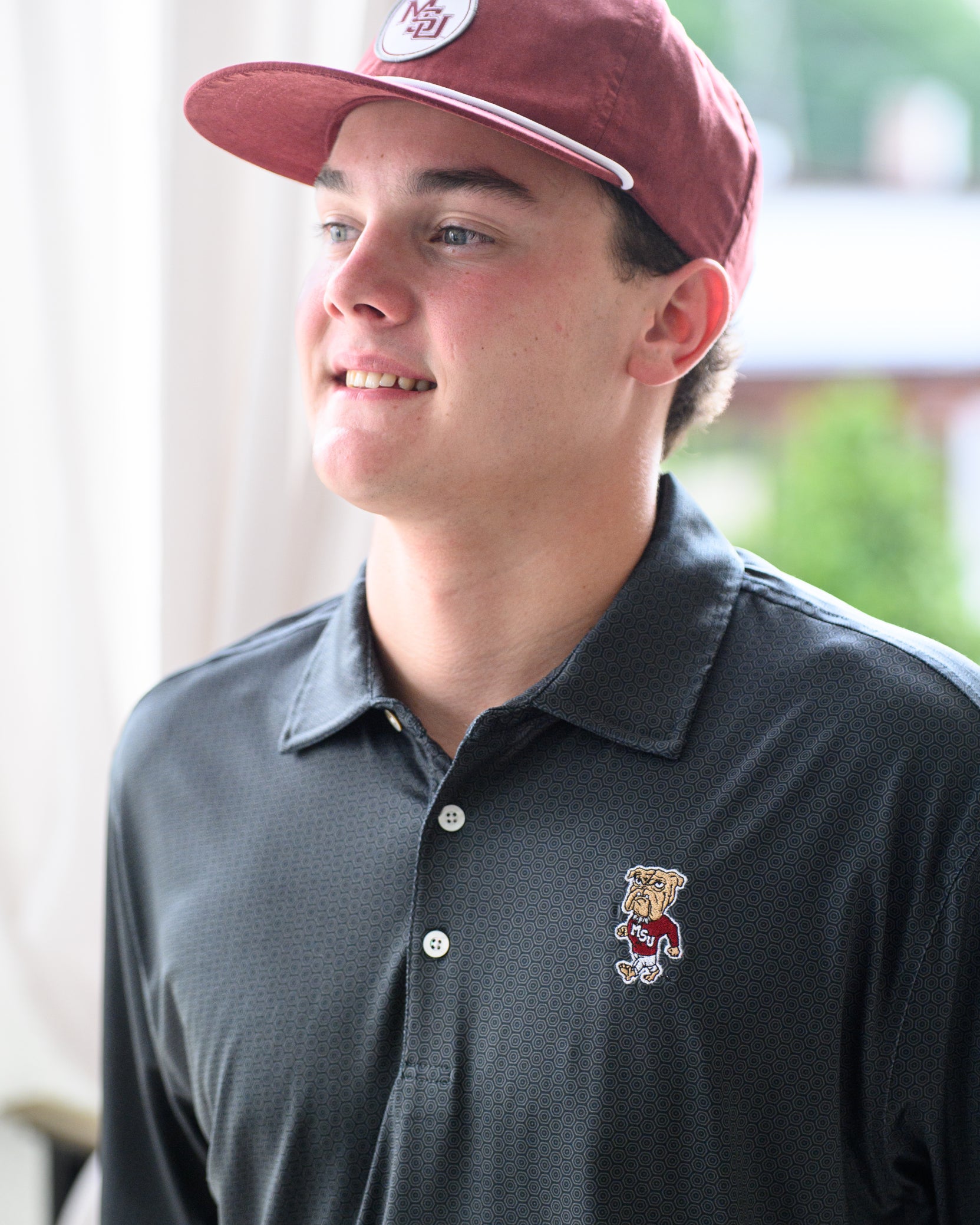 Mississippi State Black Men’s Hex Polo with the Walking Bully Logo embroidery