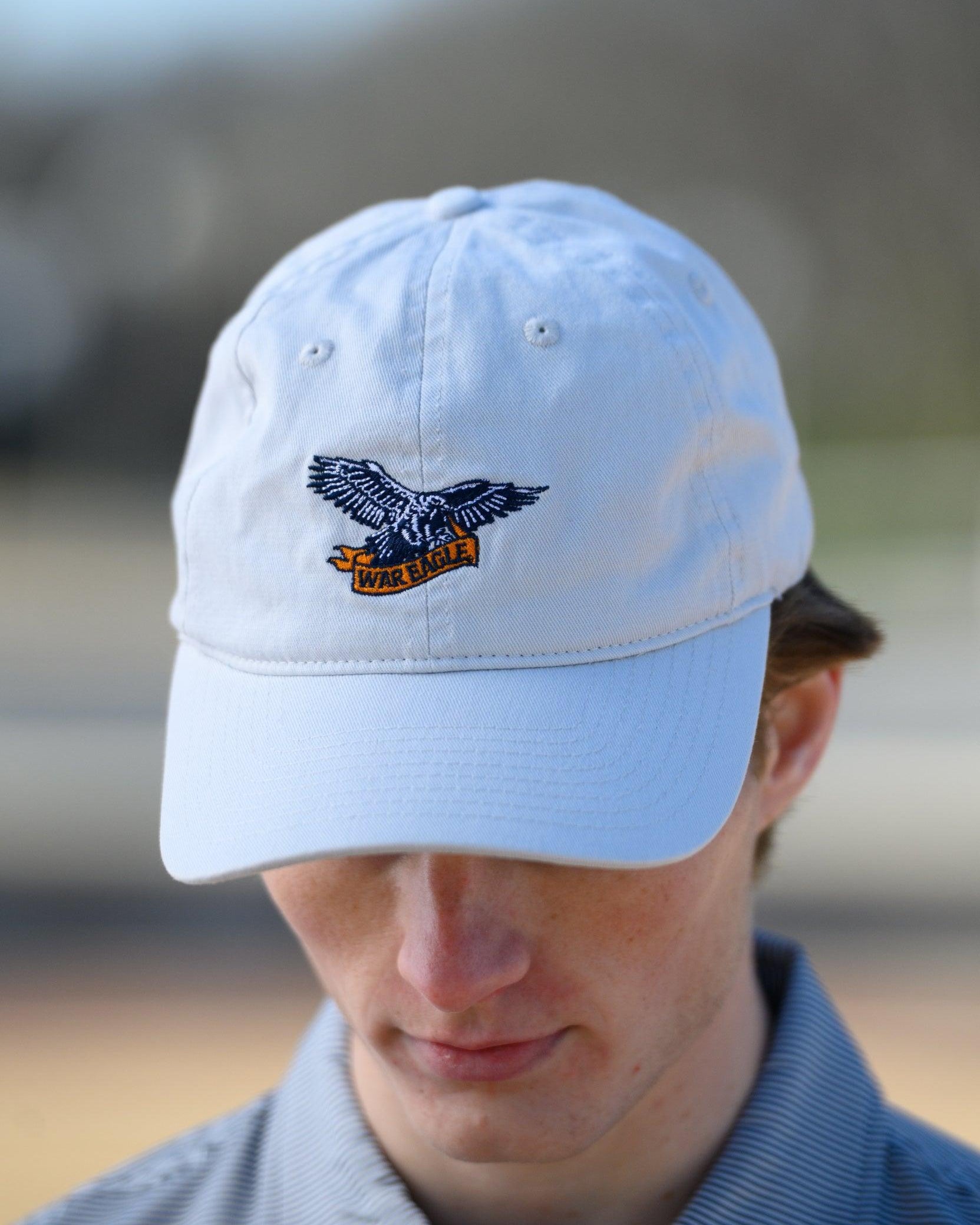 Auburn University White Dad Hat with a blue embroidered logo of the War Eagle Banner.