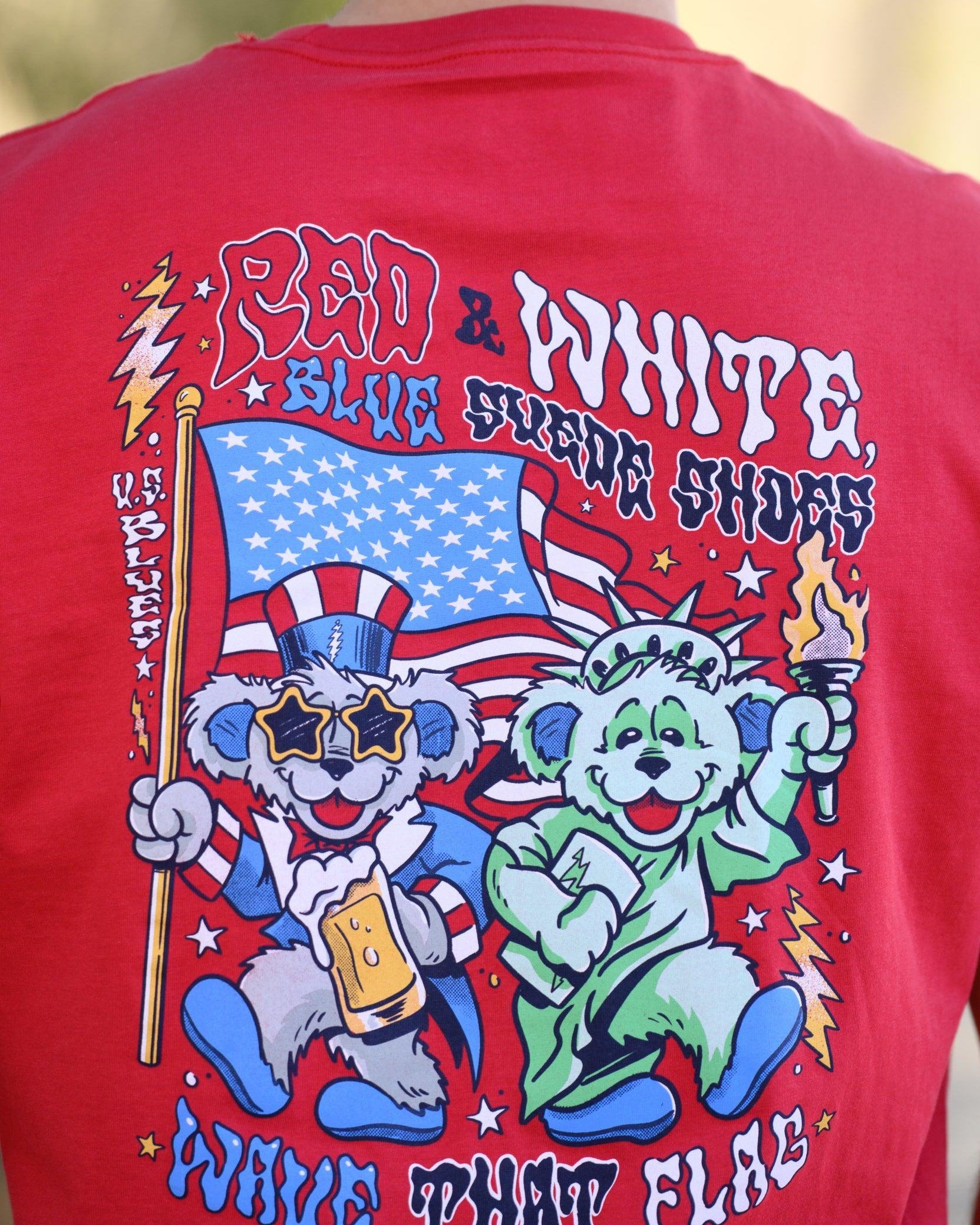 Grateful state Red T-Shirt with Dancing Bears wearing an Uncle Sam and Lady Liberty outfits and text "Red & White, Blue Suede Shoes" and "Wave That Flag"