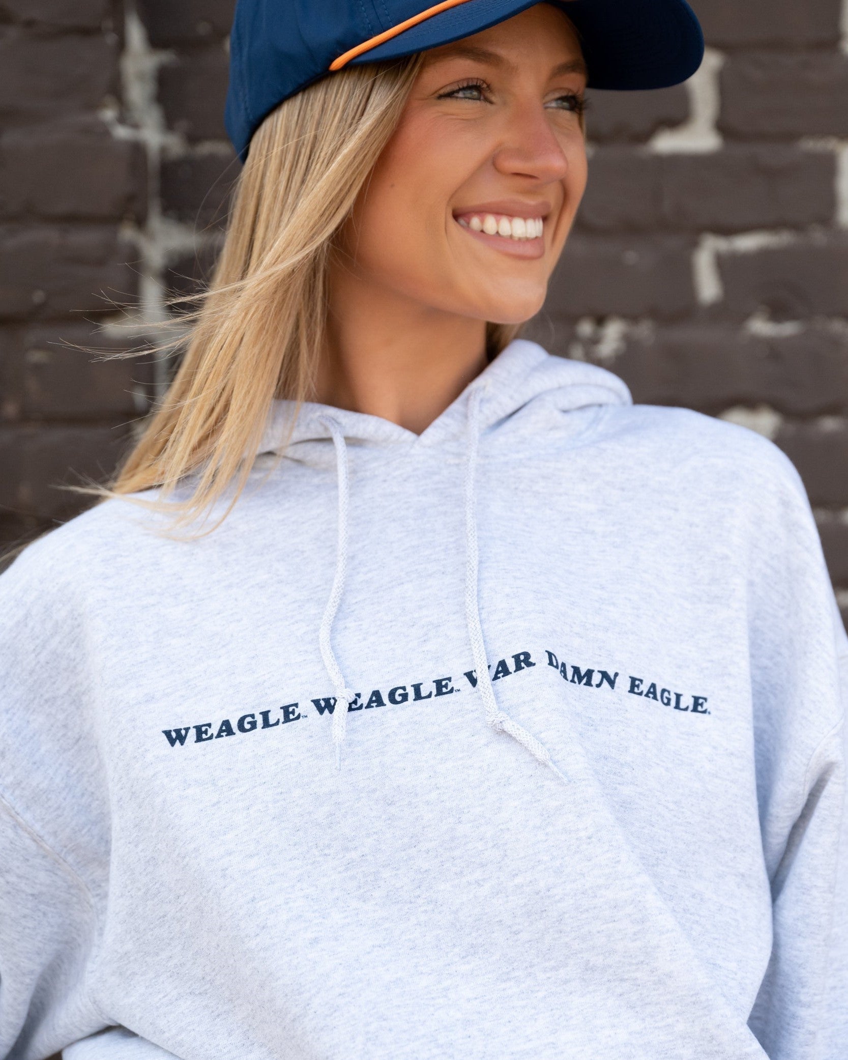 Auburn University Navy Hoodie with White embroidered text "Weagle Weagle War Damn Eagle"