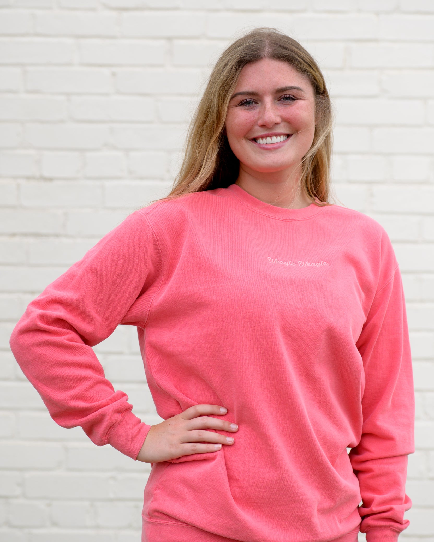 Auburn University Coral Ladies' Sweatshirt with Coral embroidered text "Weagle Weagle”