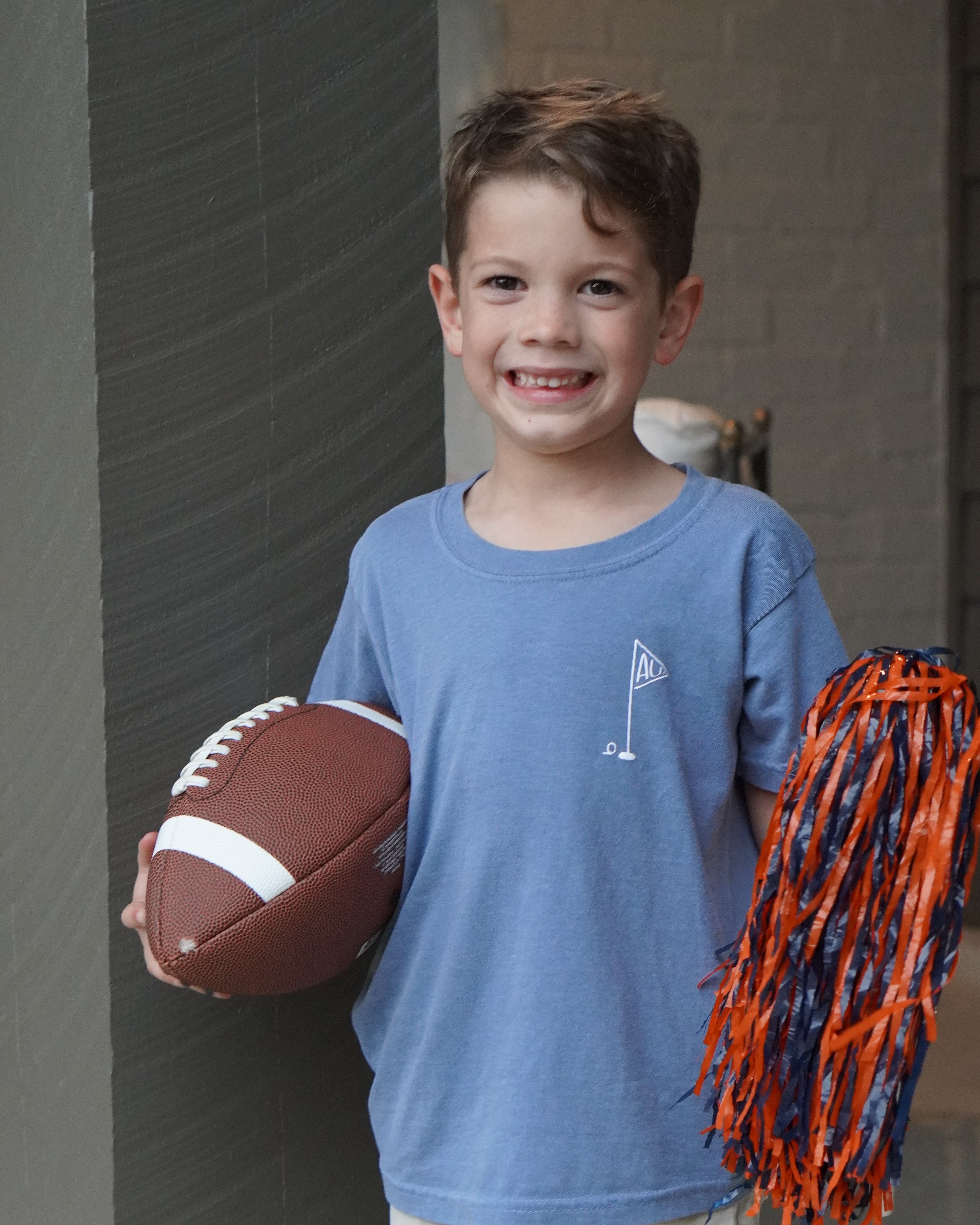 Auburn University Blue Youth T-Shirt with a small, White golf flag with "AU" inside