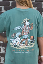 Auburn University Aubie Beach Green Comfort Colors T-Shirt with an image of Aubie the Tiger in beach clothes carrying an umbrella dragging a cooler across the sand