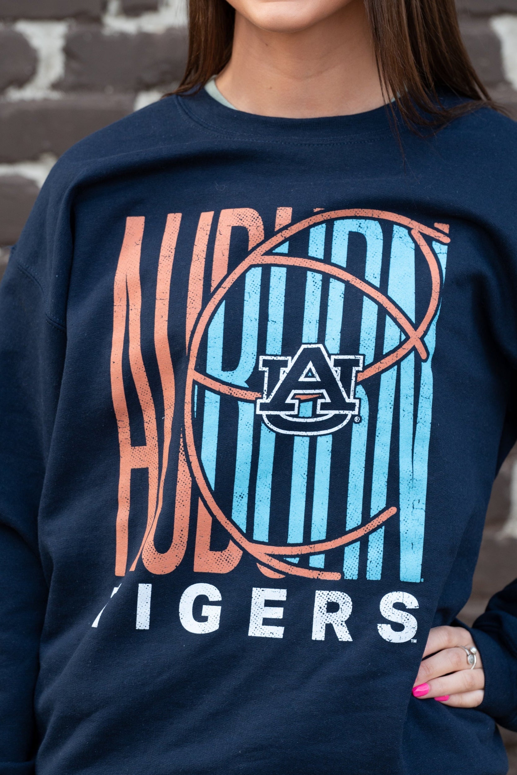 Auburn University Auburn Basketball Gildan Navy Sweatshirt  Auburn Tigers basketball sweatshirt in orange and blue colors with a retro inspired graphic design