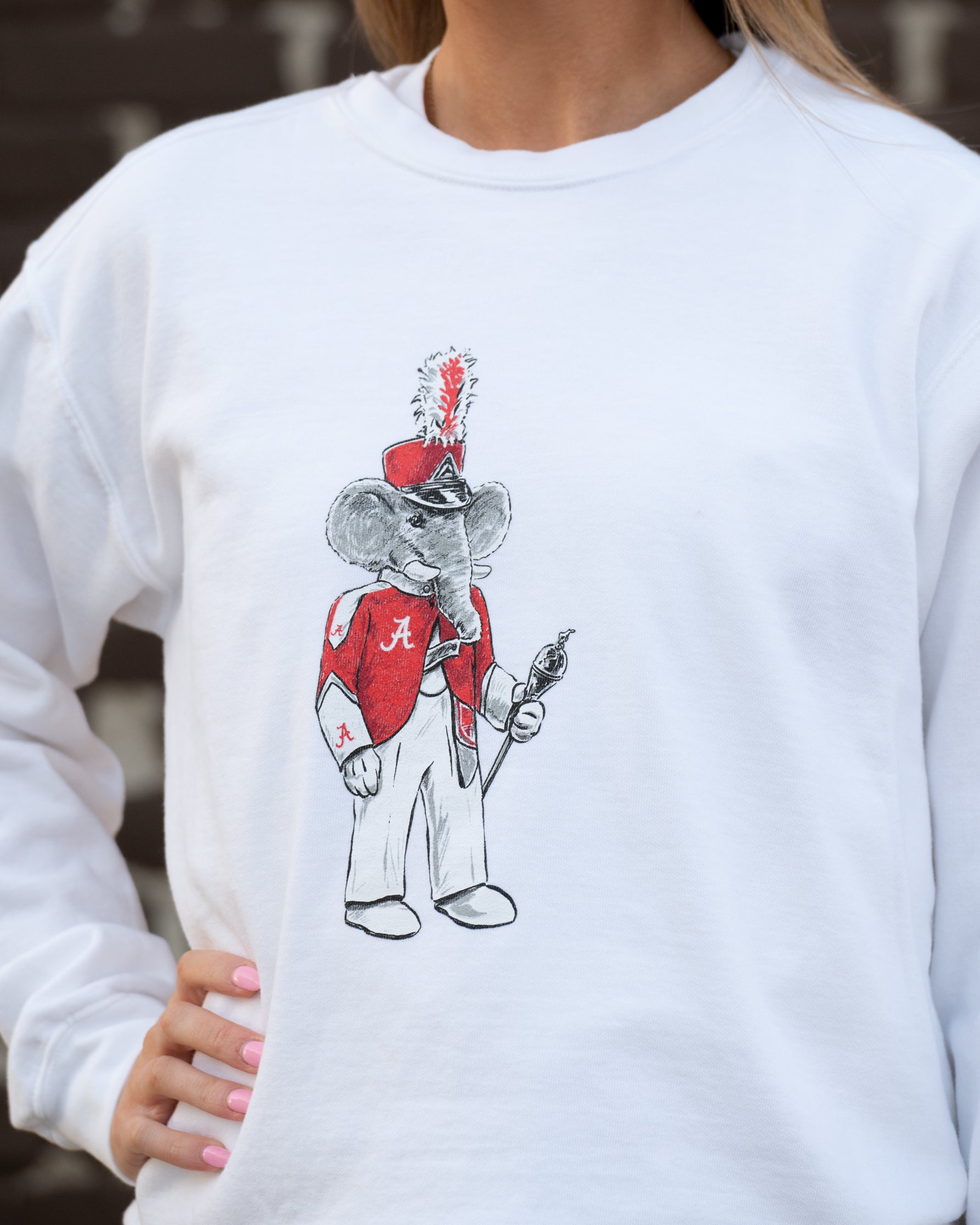 University of Alabama Big Al Drum Major White Hanes Sweatshirt with an image of Big Al wearing a Drum Major's outfit and holding the baton