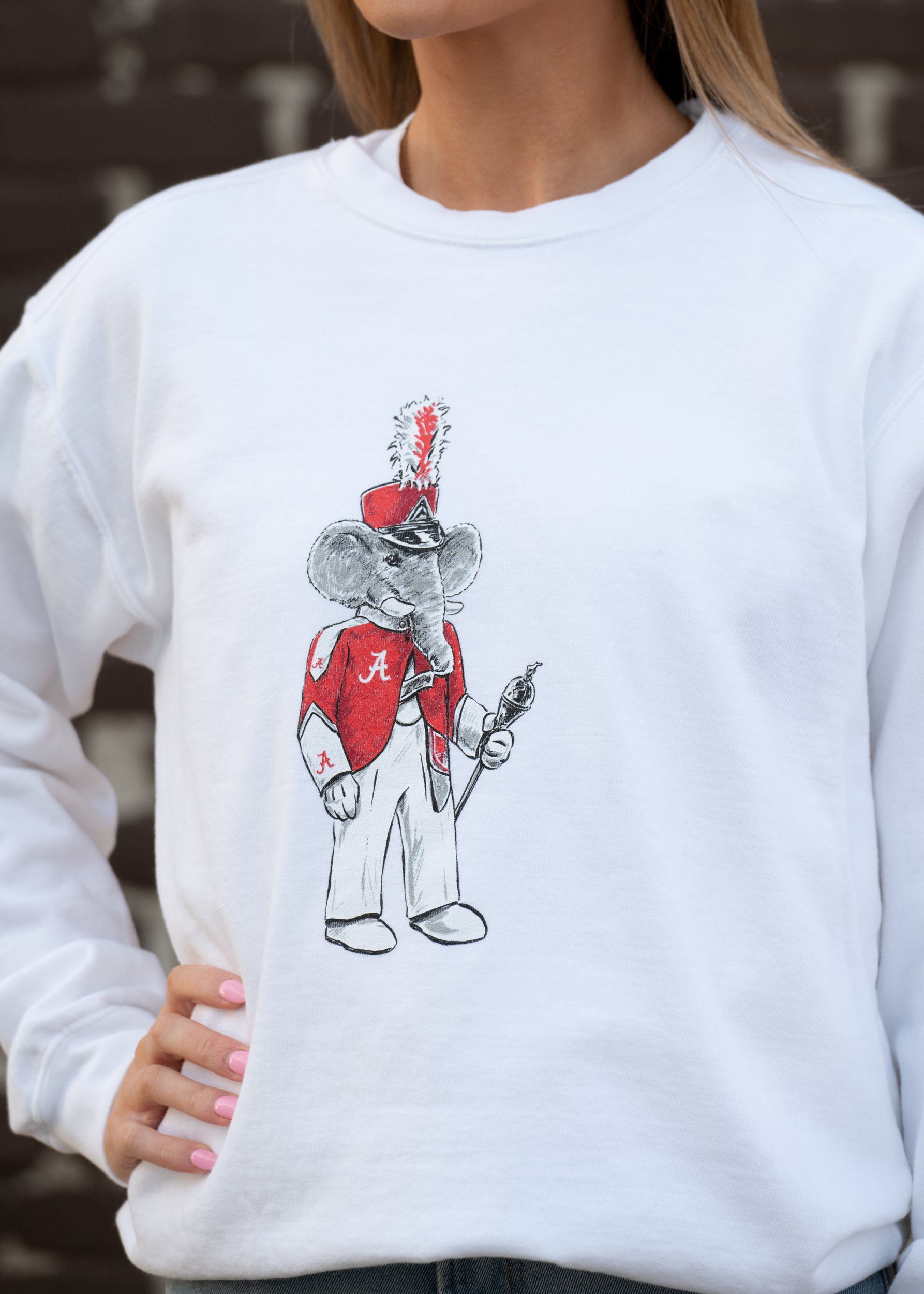 University of Alabama Big Al Drum Major White Hanes Sweatshirt with an image of Big Al wearing a Drum Major's outfit and holding the baton