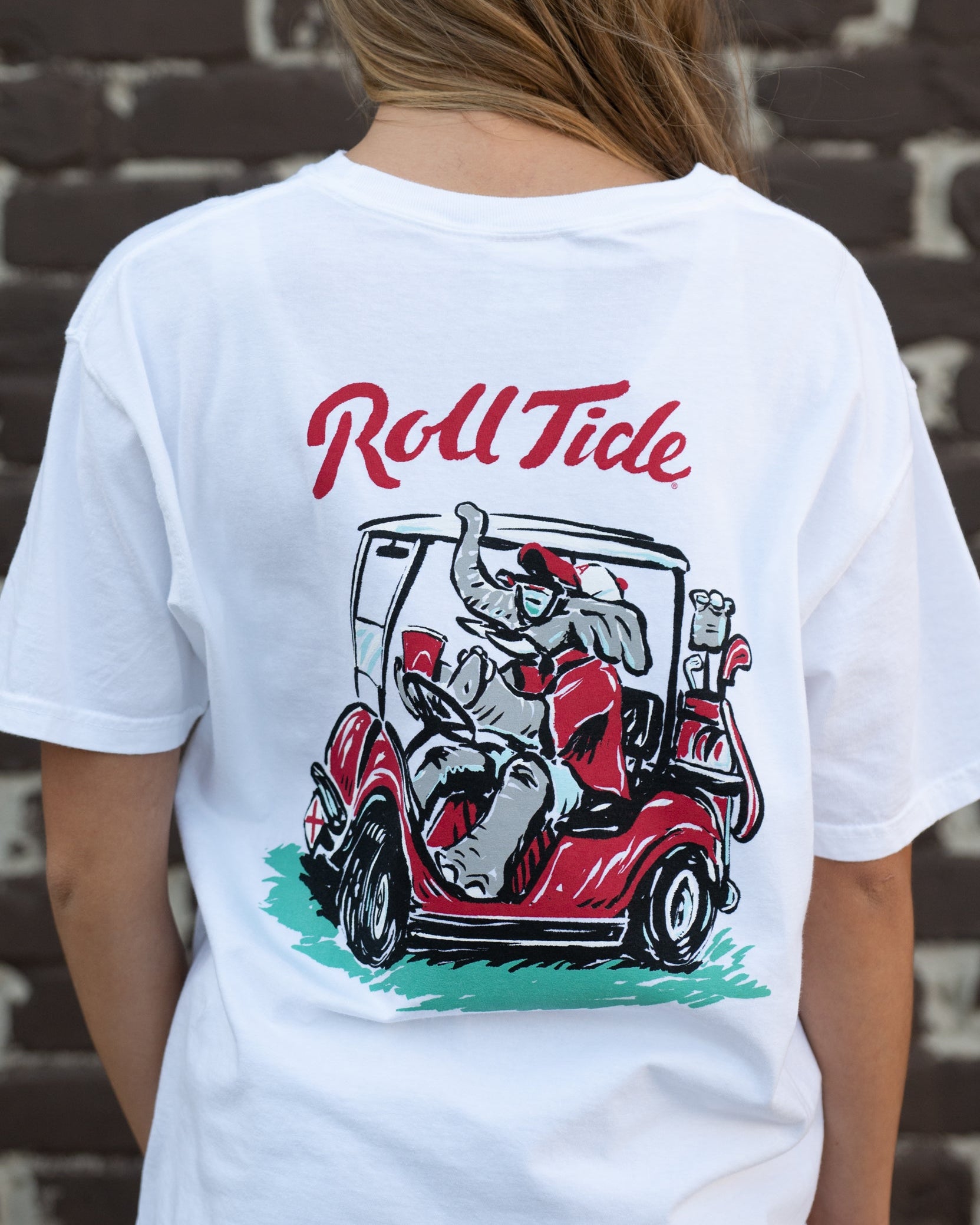 University of Alabama Big Al Golf Cart Grey Comfort Colors -Shirt with the text "Roll Tide" above an image of Big Al wearing sunglasses and driving a golf cart