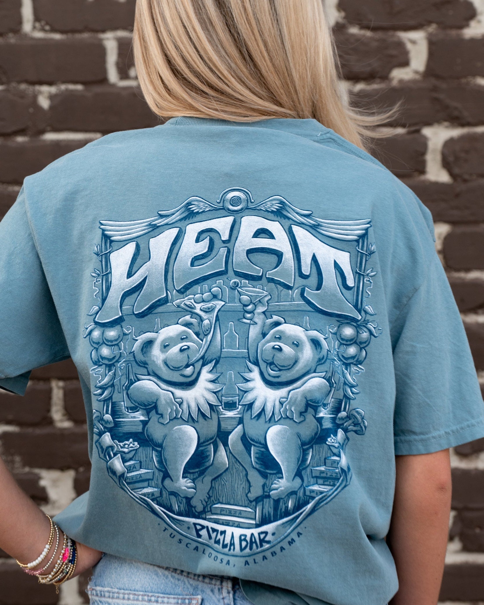 Heat Pizza Ice Blue Bar Bears T-Shirt with text Heat" above two bears, one eating pizza, the other holding a martini at the bar