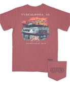 Tuscaloosa Red T-Shirt with White text "Tuscaloosa, AL" above  an illustration of a riverboat sailing underneath the Tuscaloosa Trestle as the sun sets