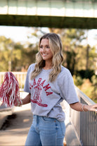 University of Alabama Grey T-Shirt with Red text “Alabama” above a Block A with an old-fashioned football player