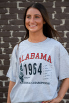 University of Alabama 1964 National Champions Light Grey Comfort Colors T-Shirt with an image of an Alabama Football player 