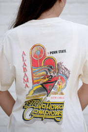  University of Alabama 1978 National Champions Comfort Colors  Ivory T- Shirt with an image of a football player running with a football and a color guard woman and yellow retro neon sign style text "1978 National Champions" 