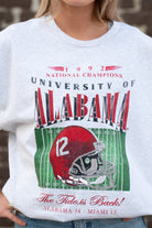  University of Alabama 1992 National Champions Comfort Colors Grey T-Shirt  with a graphic print of a football helmet and the text '1992 National Champions UNIVERSITY OF ALABAMA'. 