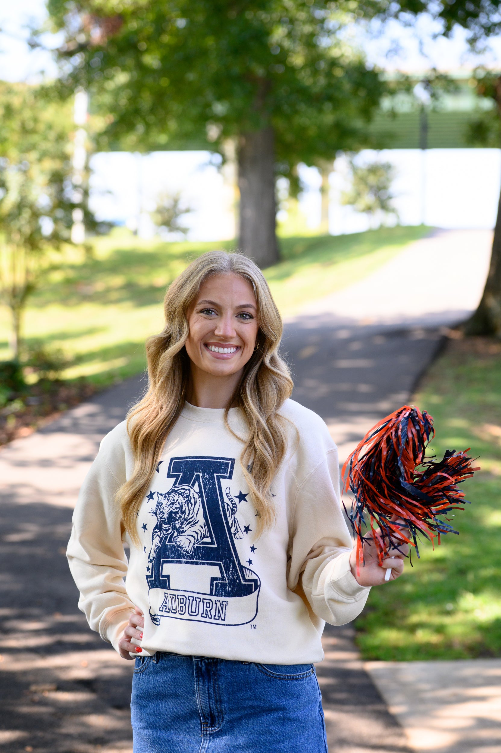Auburn University Ivory Sweatshirt with Navy stars surrounding a Navy Leaping Tiger Logo