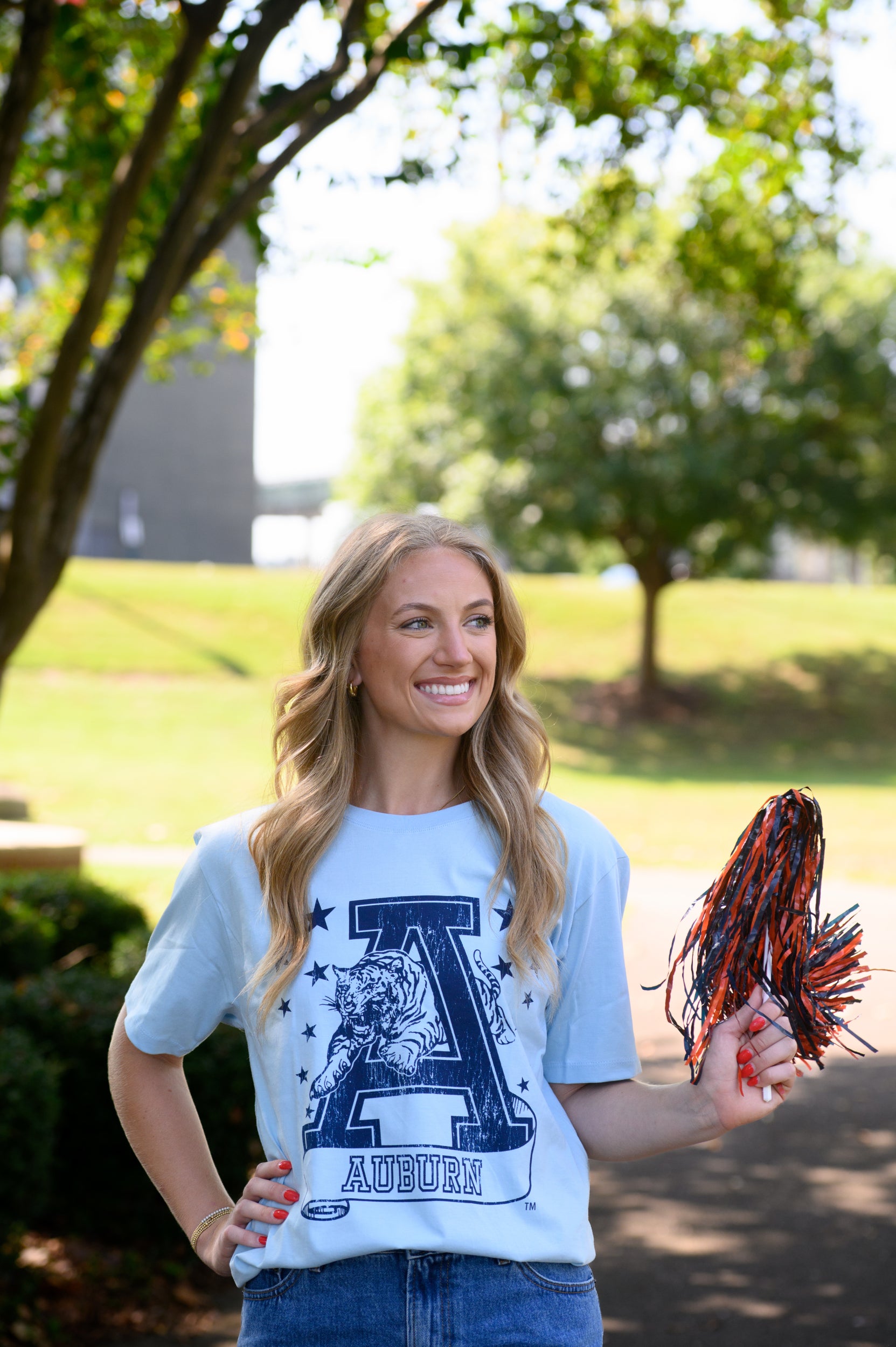 Auburn University Light Blue T-Shirt with Navy stars surrounding a Navy Leaping Tiger Logo