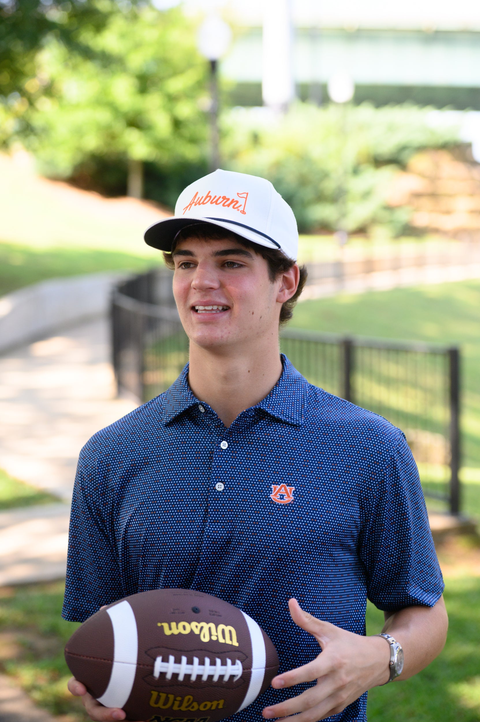 Auburn University AU Team Dot Polo (AU Logo) Navy Men's JNJ Performance Polo with a pattern of Light Blue and Orange Dots and AU Logo Embroidery