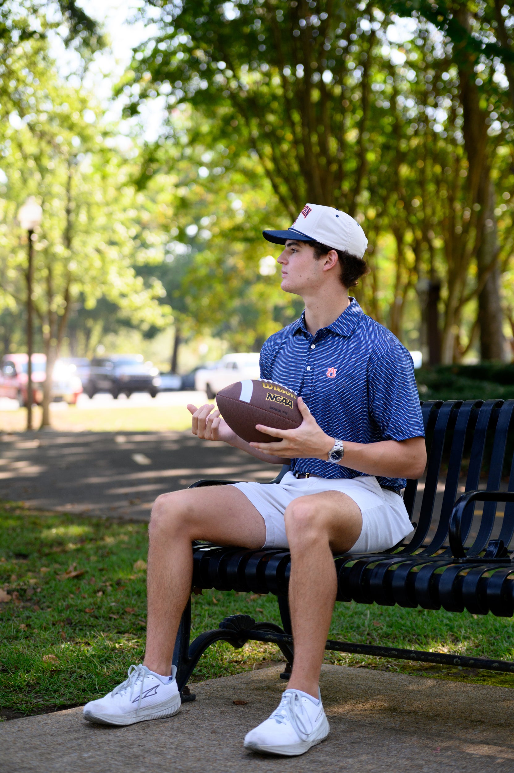 Auburn University AU Team Dot Polo (AU Logo) Navy Men's JNJ Performance Polo with a pattern of Light Blue and Orange Dots and AU Logo Embroidery