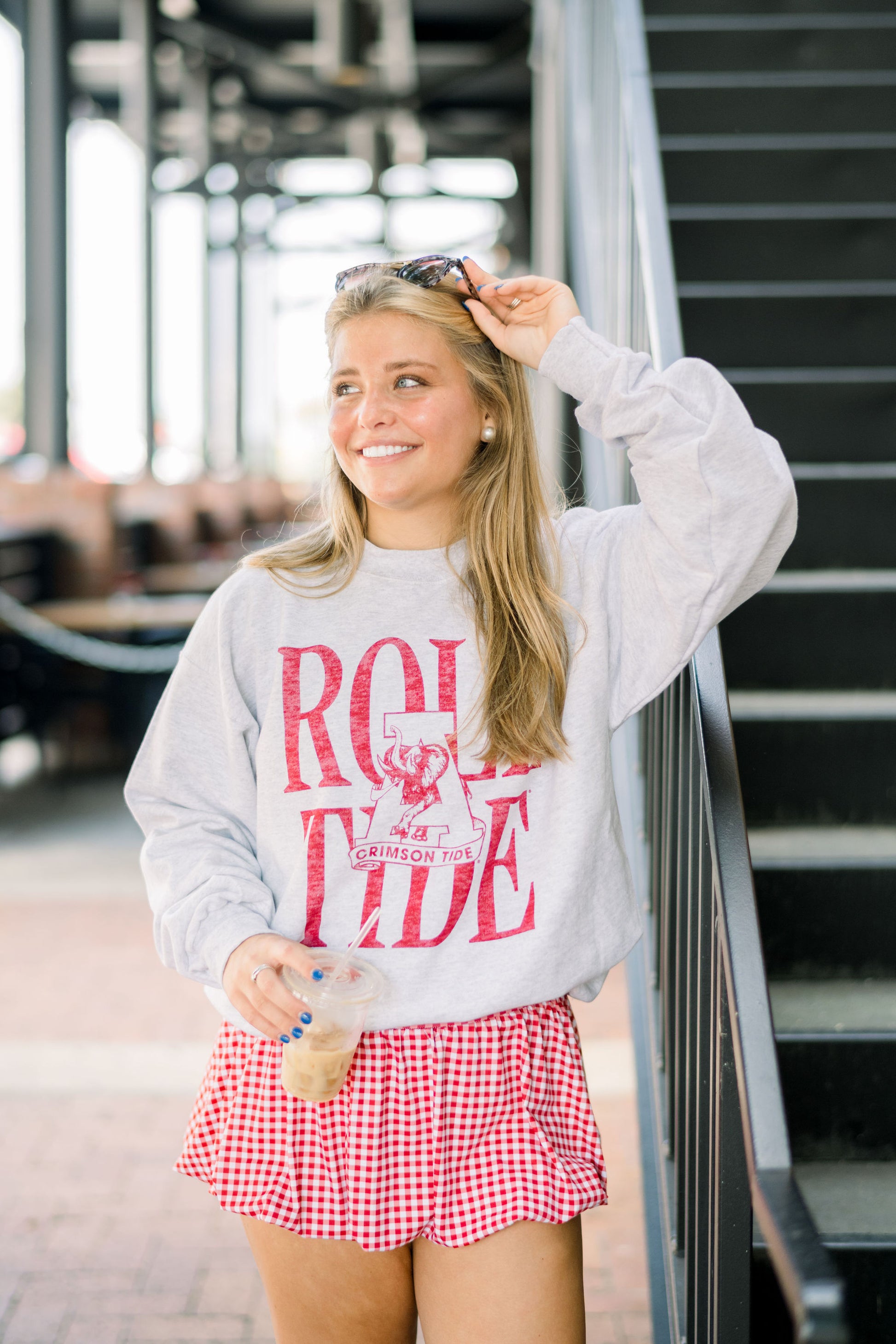 University of Alabama Light Grey Sweatshirt with Red Distressed Text “Roll Tide” behind the Vintage A logo
