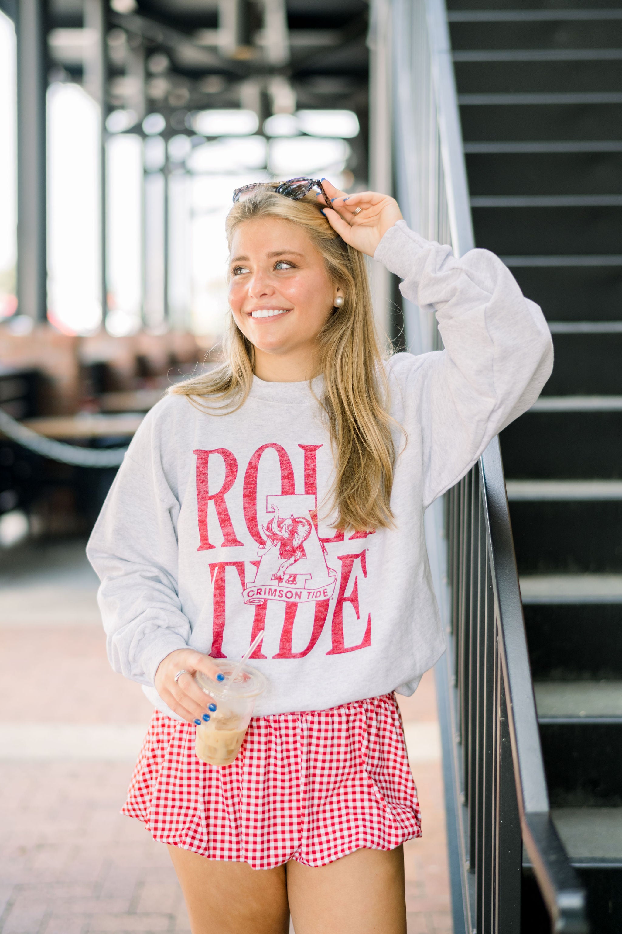 University of Alabama Light Grey Sweatshirt with Red Distressed Text “Roll Tide” behind the Vintage A logo