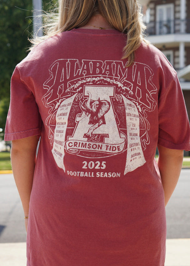 University of Alabama Crimson T-Shirt with an image of the Vintage A Logo surrounded by scrolls that read the 2025 Alabama football schedule