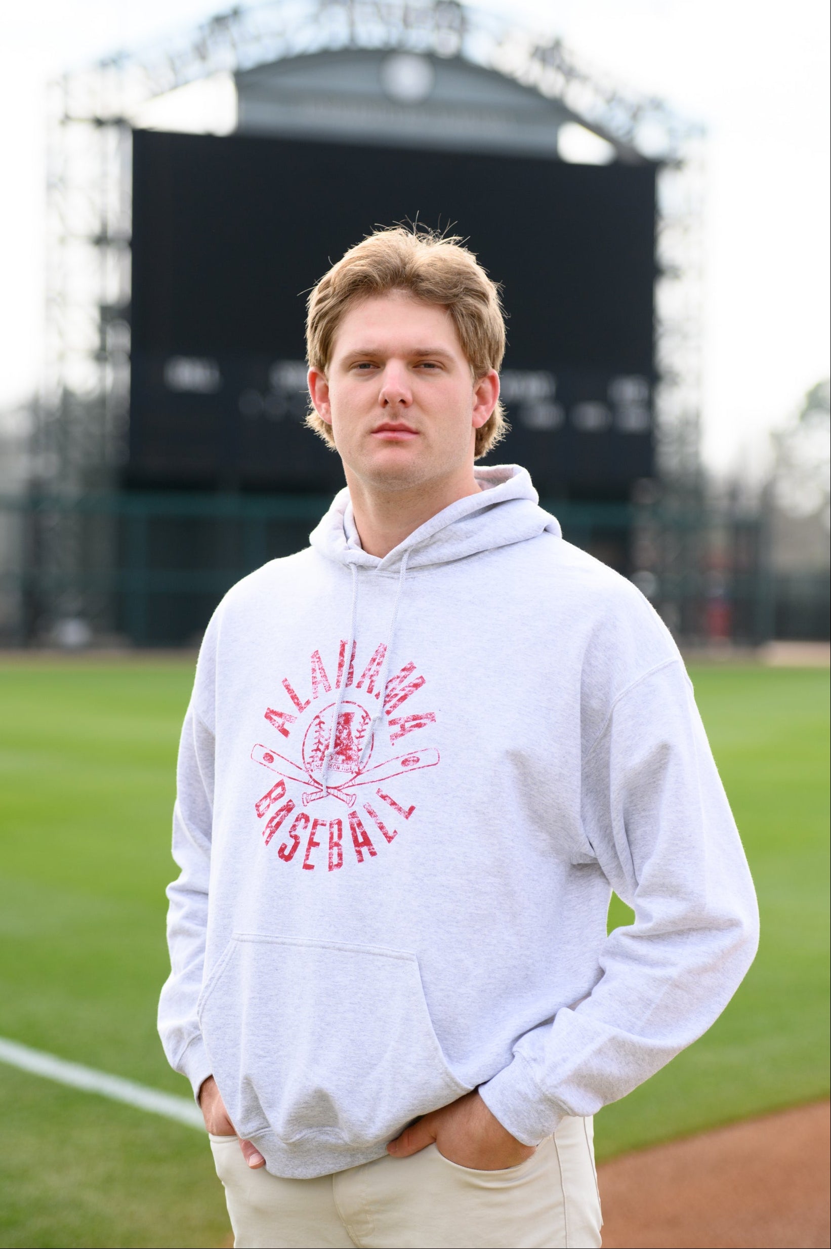 University of Alabama Distressed Light Grey Hoodie with a Red Baseball featuring the Vintage A logo over crossed baseball bats, surrounded by Red text “Alabama Baseball”