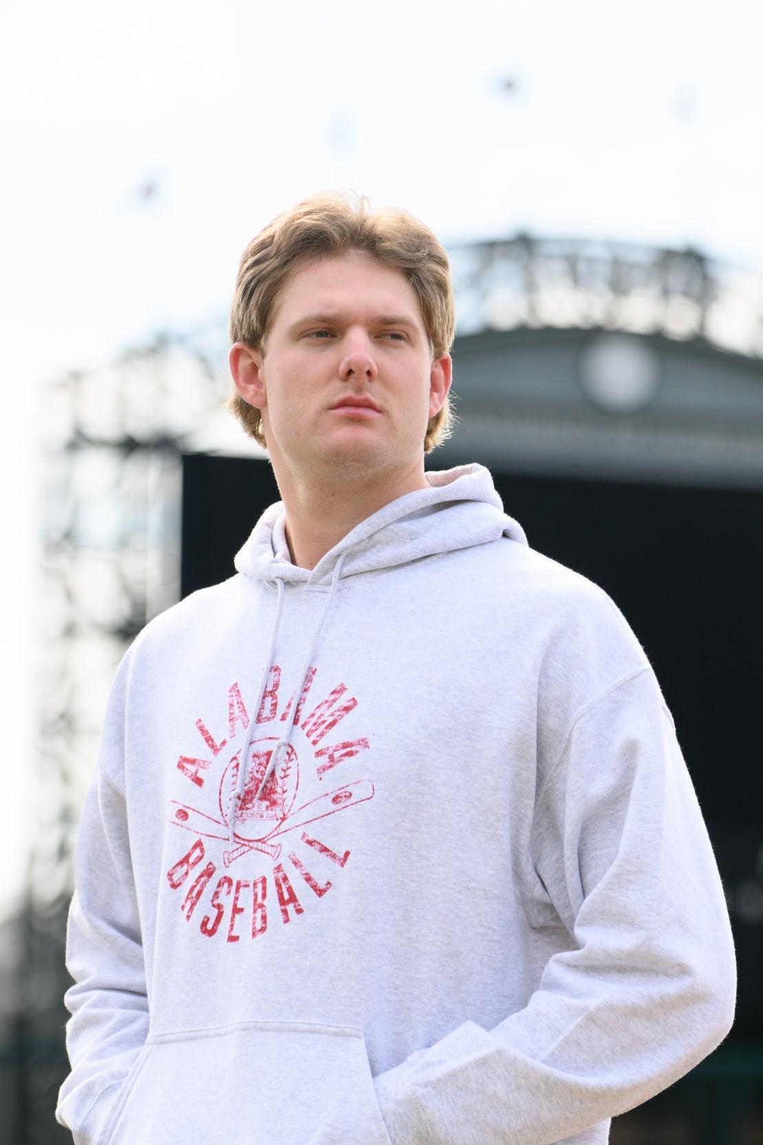 University of Alabama Distressed Light Grey Hoodie with a Red Baseball featuring the Vintage A logo over crossed baseball bats, surrounded by Red text “Alabama Baseball”