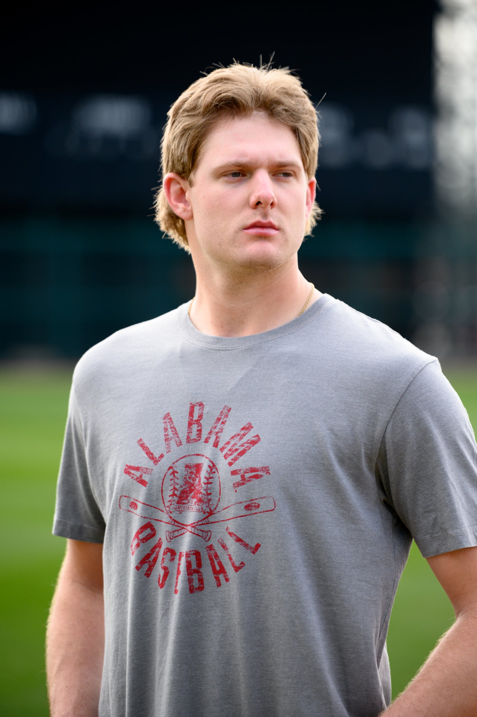 University of Alabama Distressed Grey T-Shirt with a Red Baseball featuring the Vintage A logo over crossed baseball bats, surrounded by White text “Alabama Baseball”