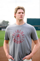 University of Alabama Distressed Grey T-Shirt with a Red Baseball featuring the Vintage A logo over crossed baseball bats, surrounded by White text “Alabama Baseball”