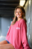 University of Alabama Red Sweatshirt with White “Alabama” script and baseball bat embroidery