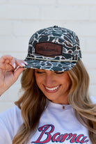 University of Alabama Camo Hat with White rope and Leather patch with text "University of Alabama"