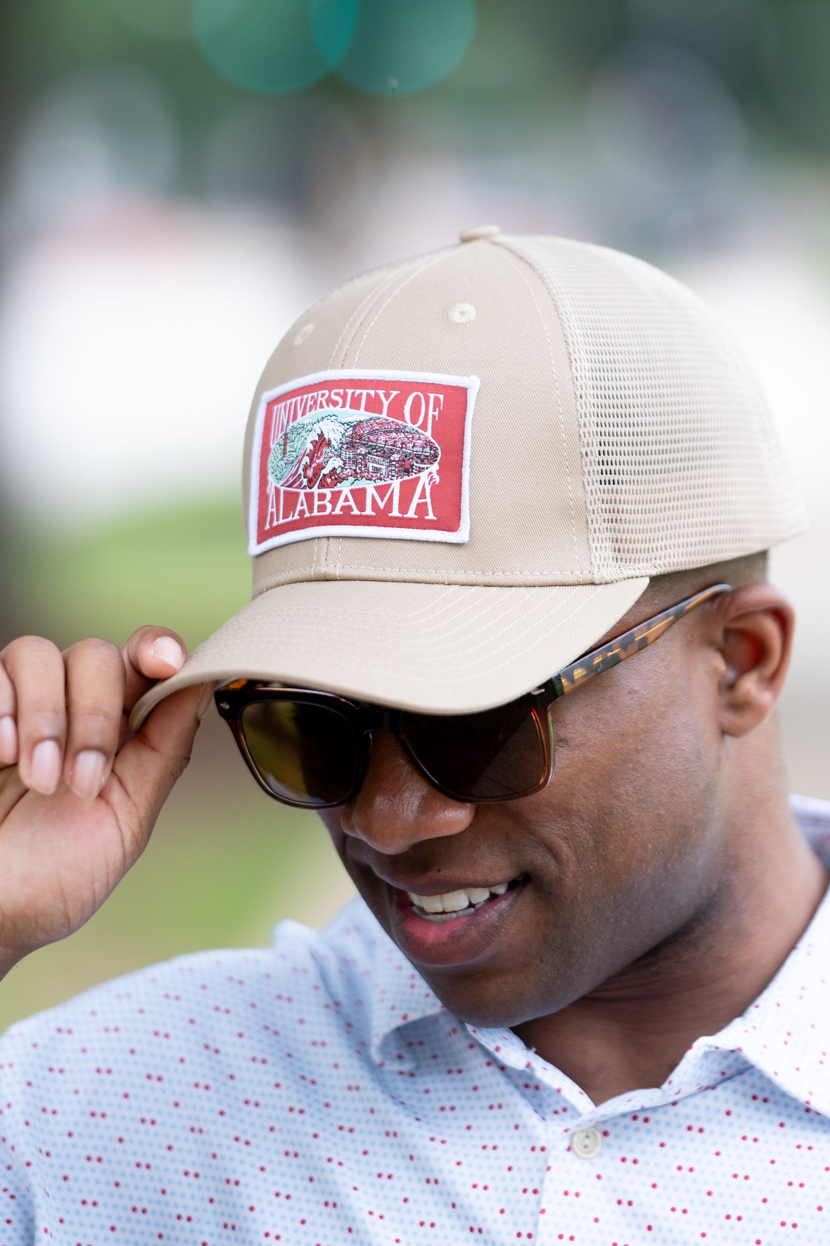 University of Alabama Beige Campus Trucker Hat with a patch that features the University of Alabama logo.