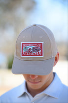University of Alabama Beige Trucker Hat with a patch that features the University of Alabama logo.