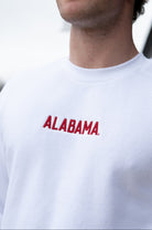 University of Alabama White American Apparel Sweatshirt with 'ALABAMA' embroidered on the front in red letters.