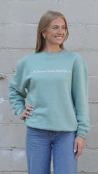 University of Alabama Seafoam Crewneck with cursive writing on the front and an open locket with the writing “Bama” inside on the back