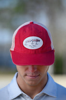 University of Alabama Red Trucker Hat featuring a patch with an image of a fishing lure with Red text "Alabama"
