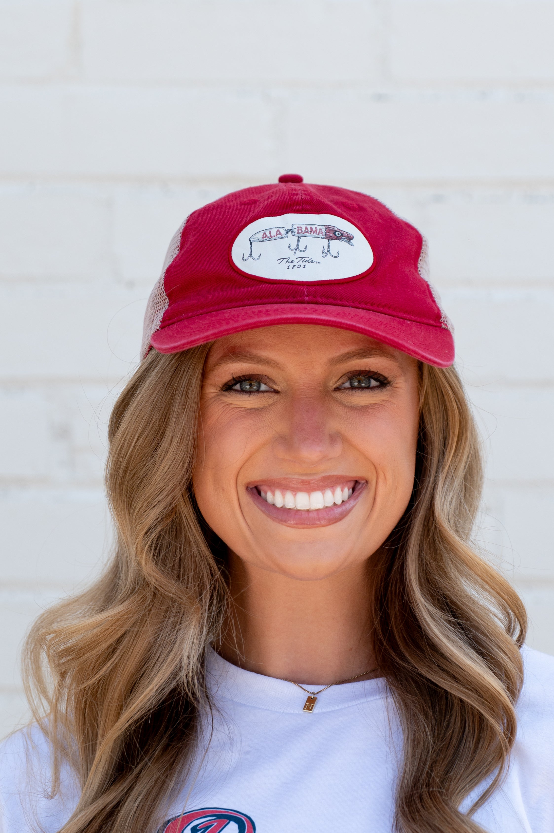 University of Alabama Red Hat Featuring a patch with an image of a fishing lure with Red text "Alabama"