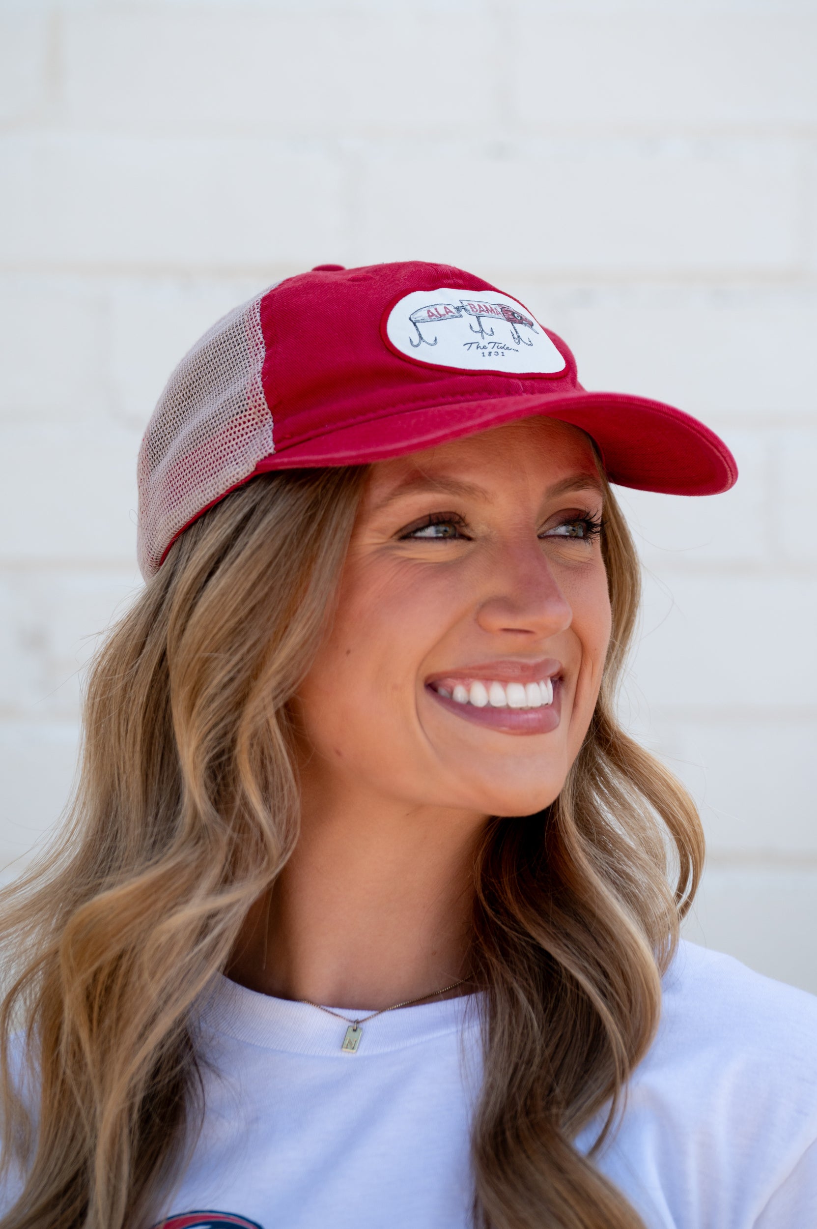 University of Alabama Red Hat Featuring a patch with an image of a fishing lure with Red text "Alabama"