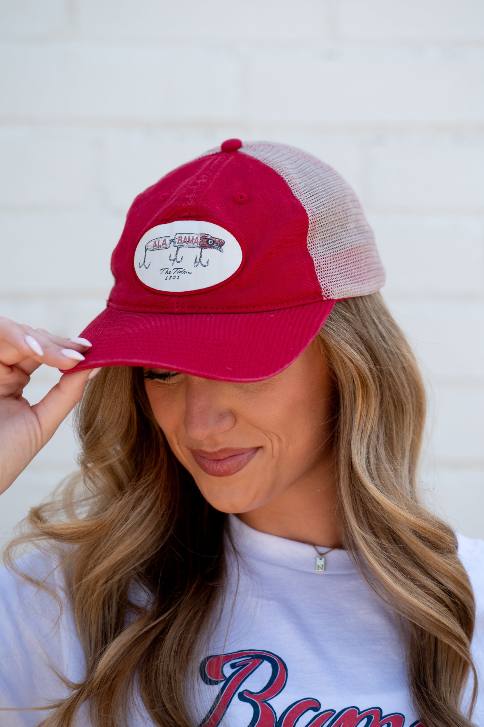 University of Alabama Red Hat Featuring a patch with an image of a fishing lure with Red text "Alabama"