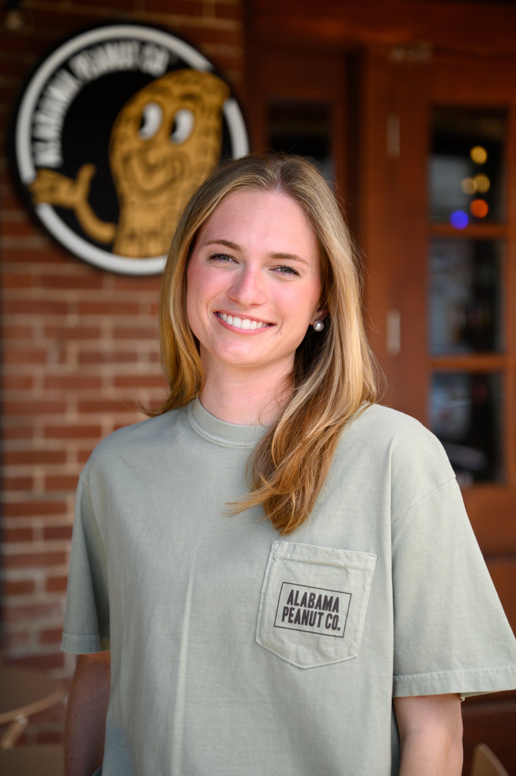 Front Pocket with Brown “Alabama Peanut Co.” Text