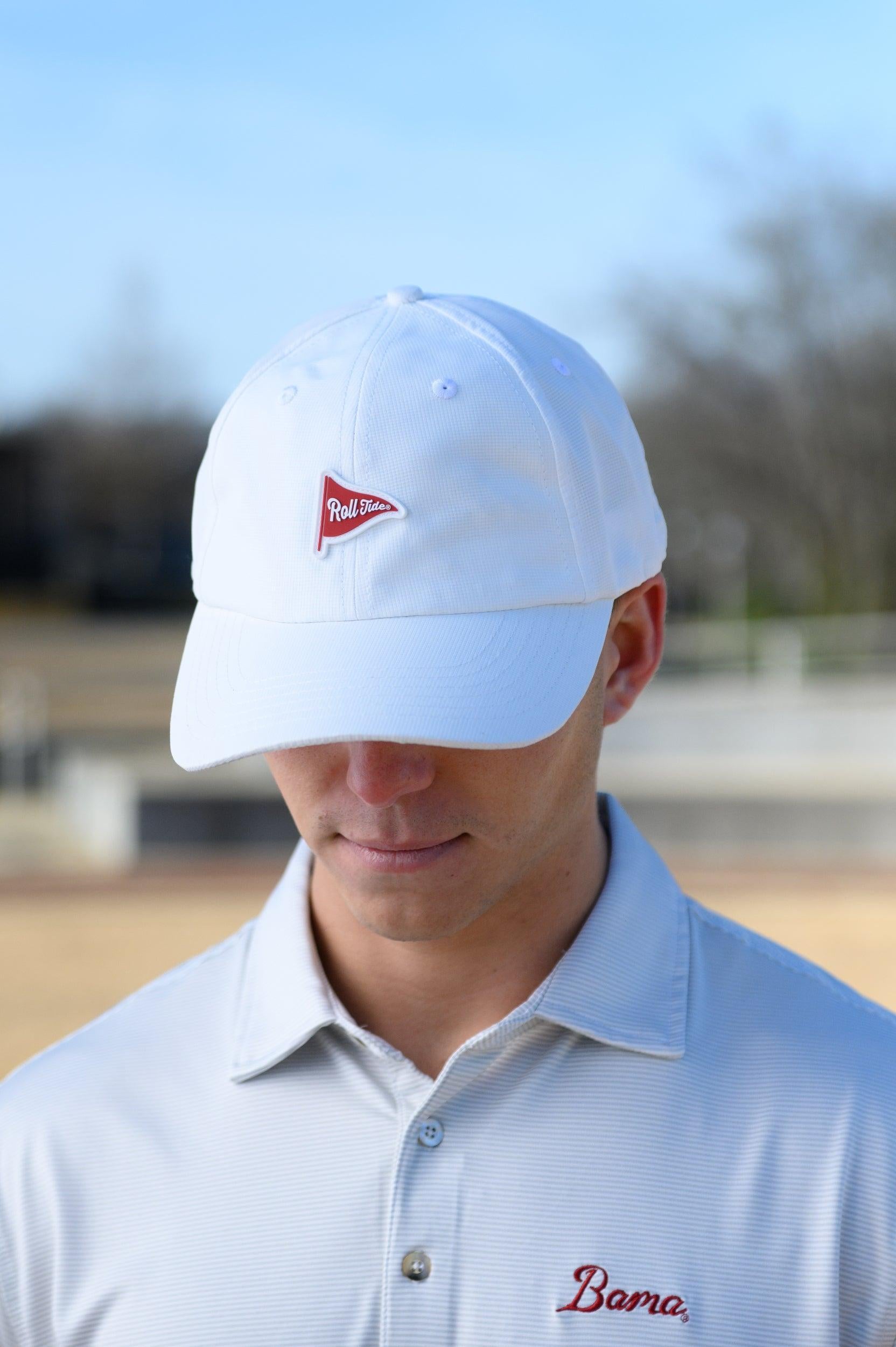 University of Alabama White Hat with a patch of a Red golf flag with White script, “Roll Tide”