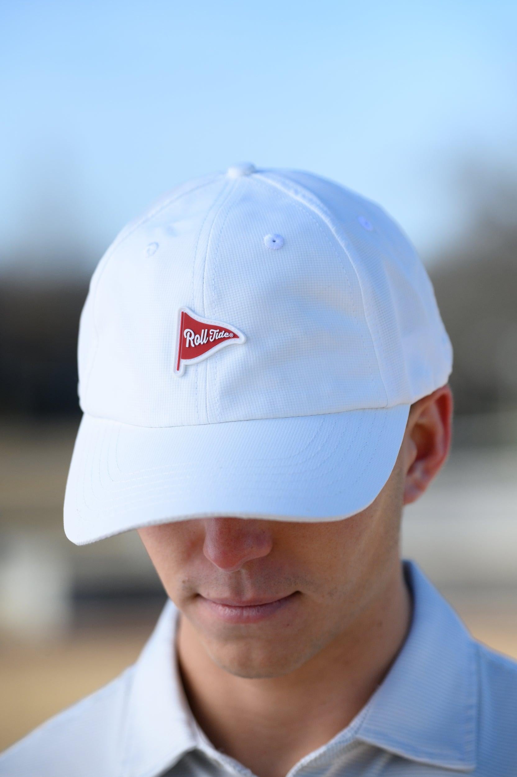 University of Alabama White Hat with a patch of a Red golf flag with White script, “Roll Tide”