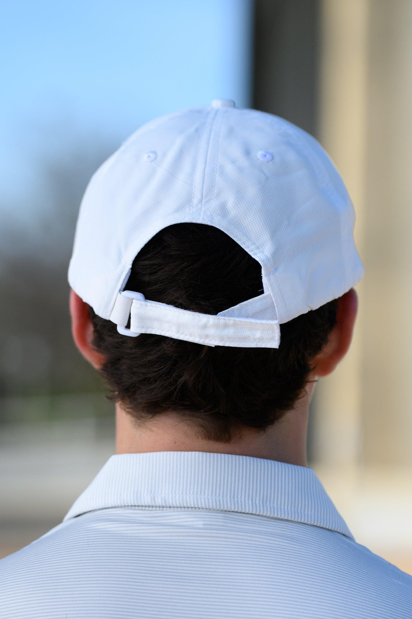 University of Alabama White Hat with a patch of a Red golf flag with White script, “Roll Tide”
strap back
